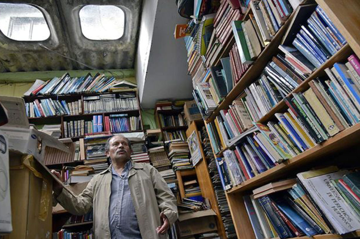Bookshelves piled on top of bookshelves Bookshelves piled on top of bookshelves
